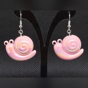 Pearlescent pink snail earrings